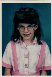 Illustration for article titled Goofy Glasses, Pretty Pigtails & Snaggletooth Smiles: September Is For School Portraits